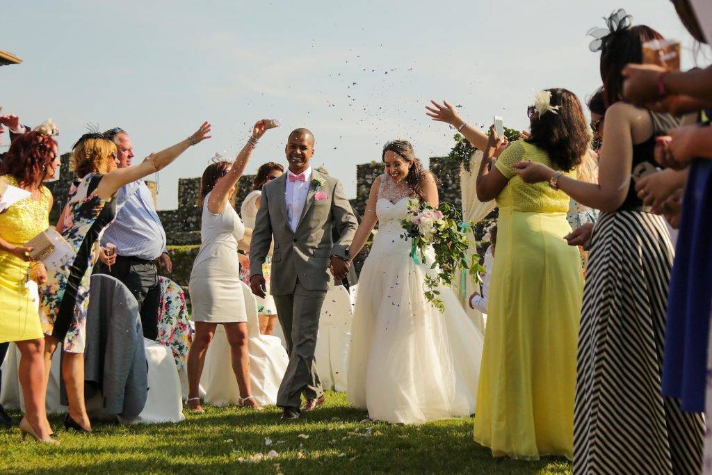 Bride & Groom being showered in confetti at Lonato Castle