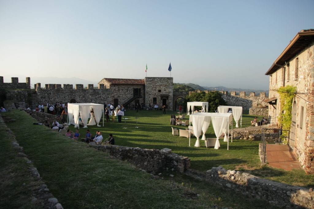 Wedding reception set within the walls of a hill top fortress on Lake Garda